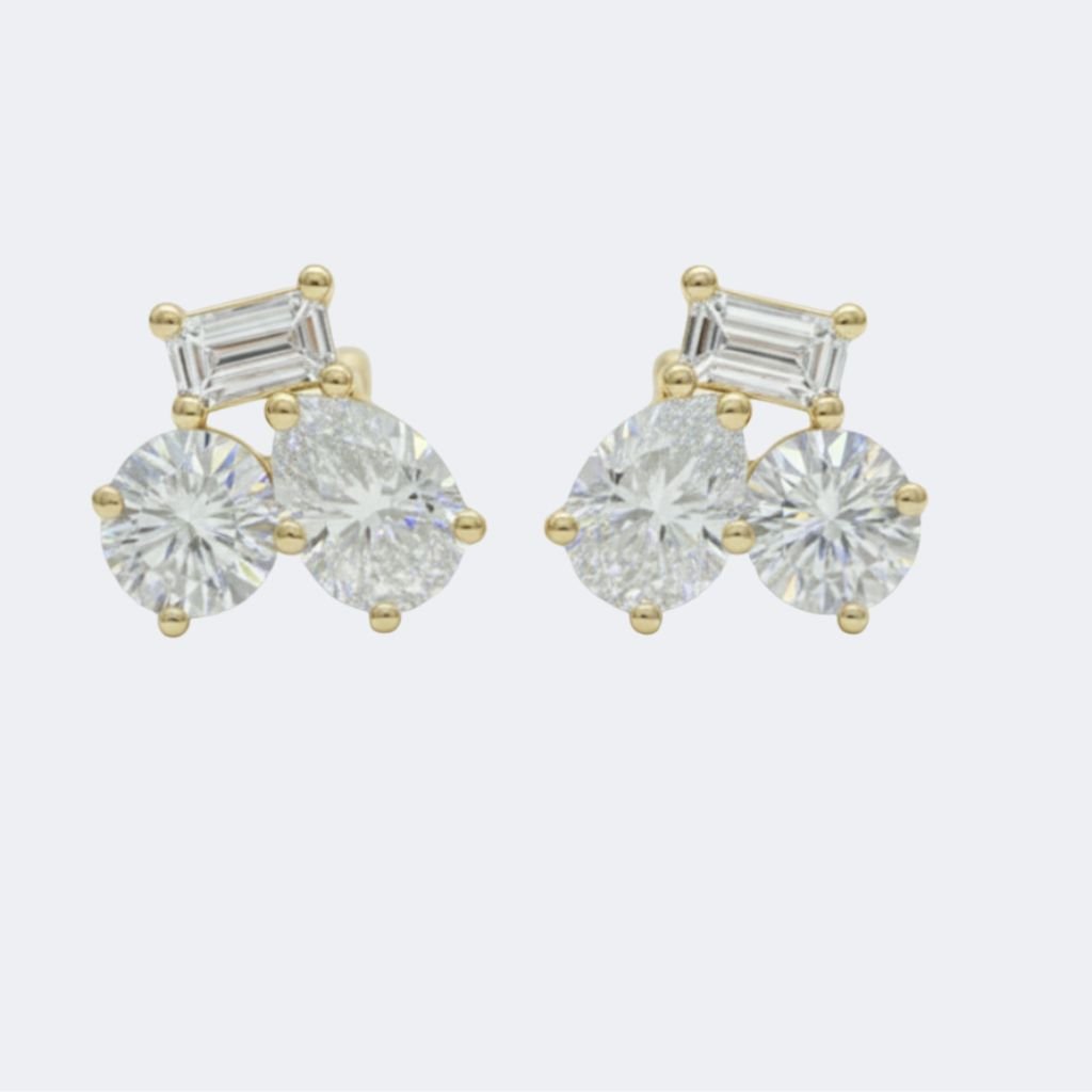 0.70CTW Round, Pear, Baguette Shape Prong Three Stone Multi Stud