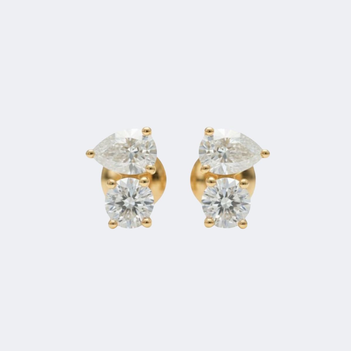 0.50CTW Round-Pear Prong Toi et Moi Stud