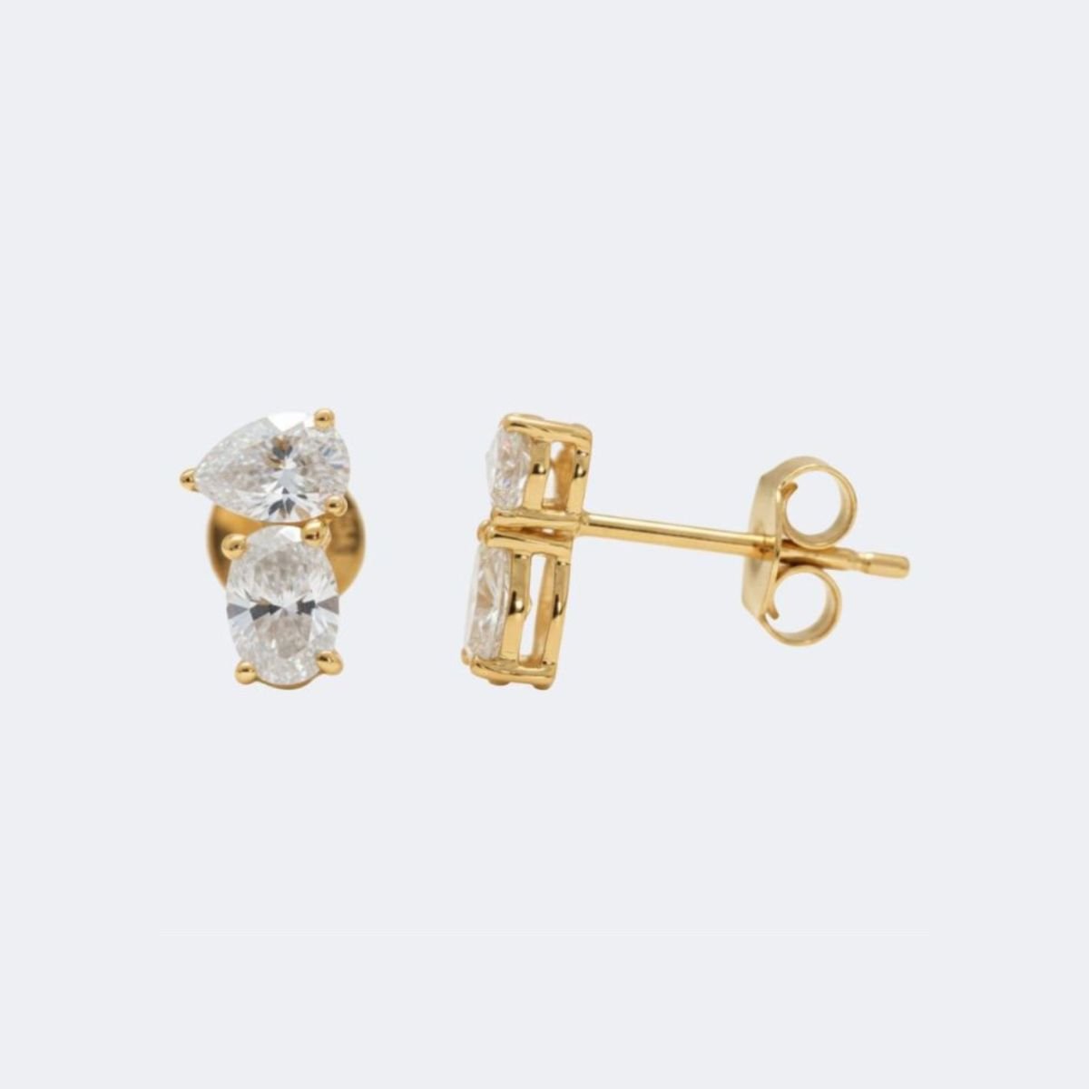 1.00CTW Oval, Pear Prong Toi et Moi Stud