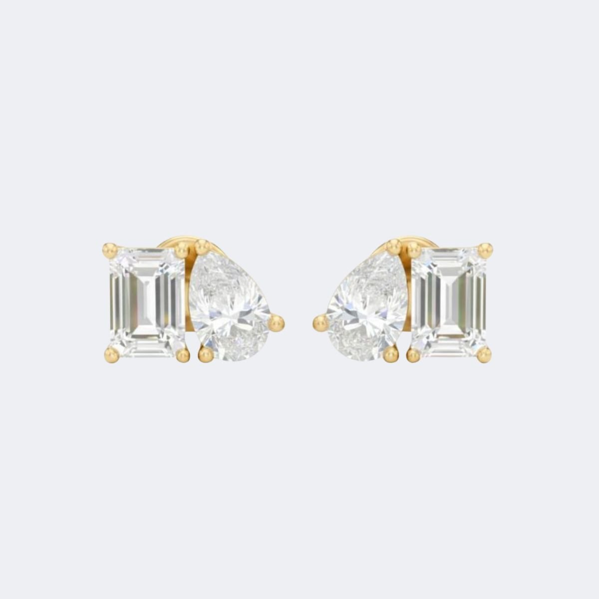 1.00CTW Emerald-Pear Prong Toi et Moi Stud