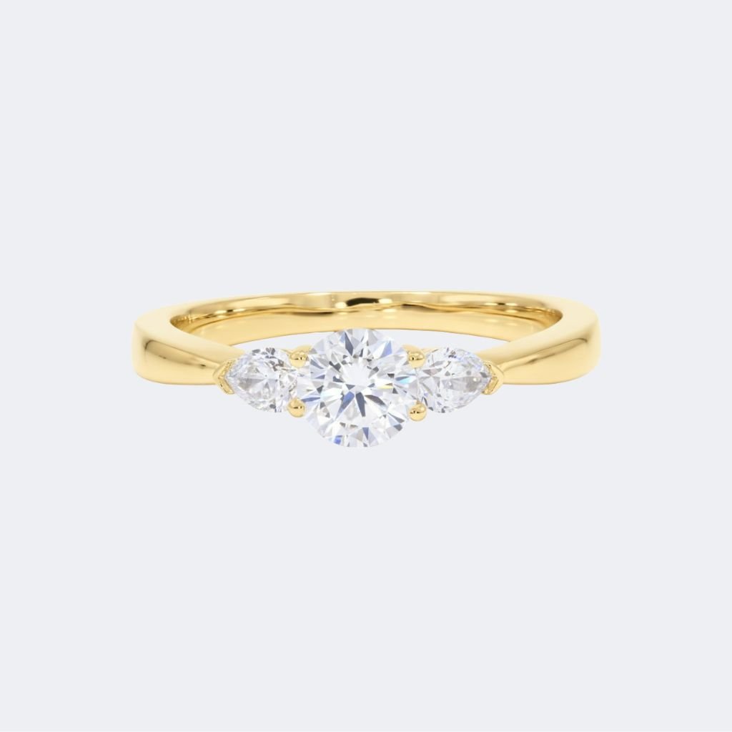 0.85CTW Round Cut Solitaire Ring - Pear Side Stone