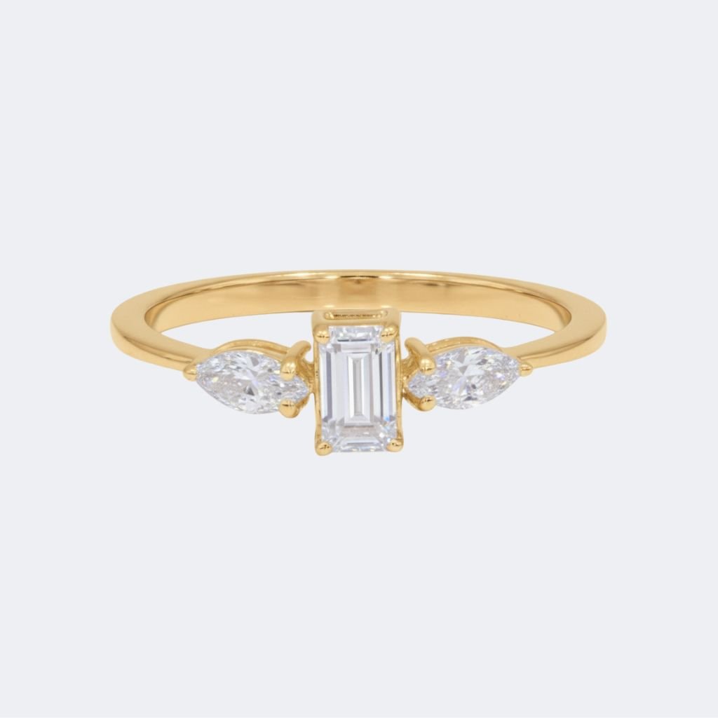 0.55CTW Emerald Cut Solitaire Ring - Marquise Accented